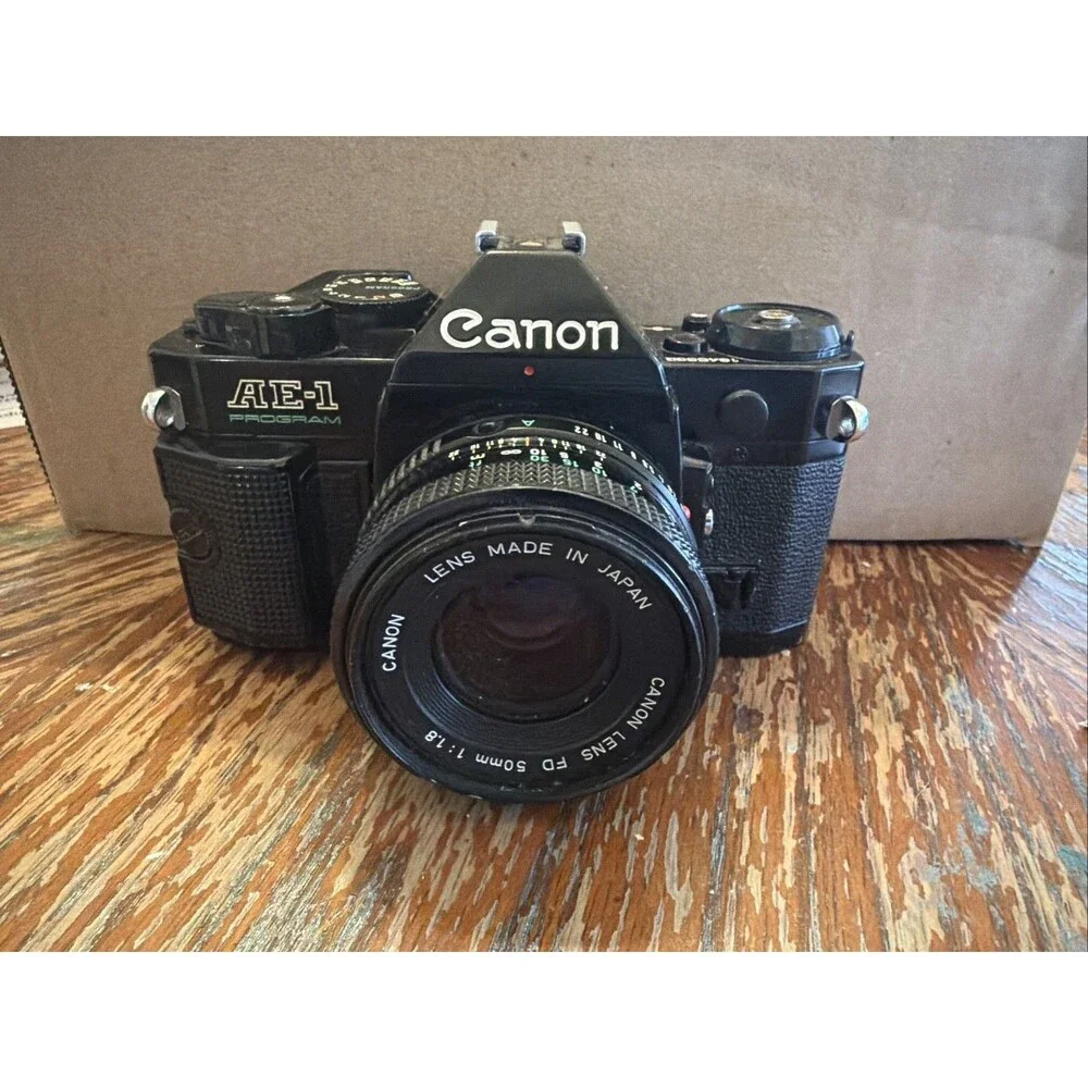 Canon AE-1 Program Black 35mm SLR Film Camera w/ 50mm f/1.8 FD Lens - WORKING !